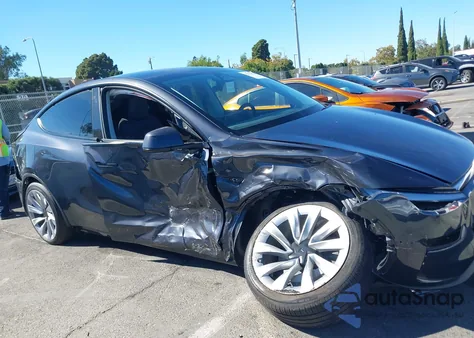 2026 Tesla Model Y Long Range Dual Motor All-Wheel Drive/Long Range Launch Series from USA, damaged, VIN 7SAYGDEE4TF335586